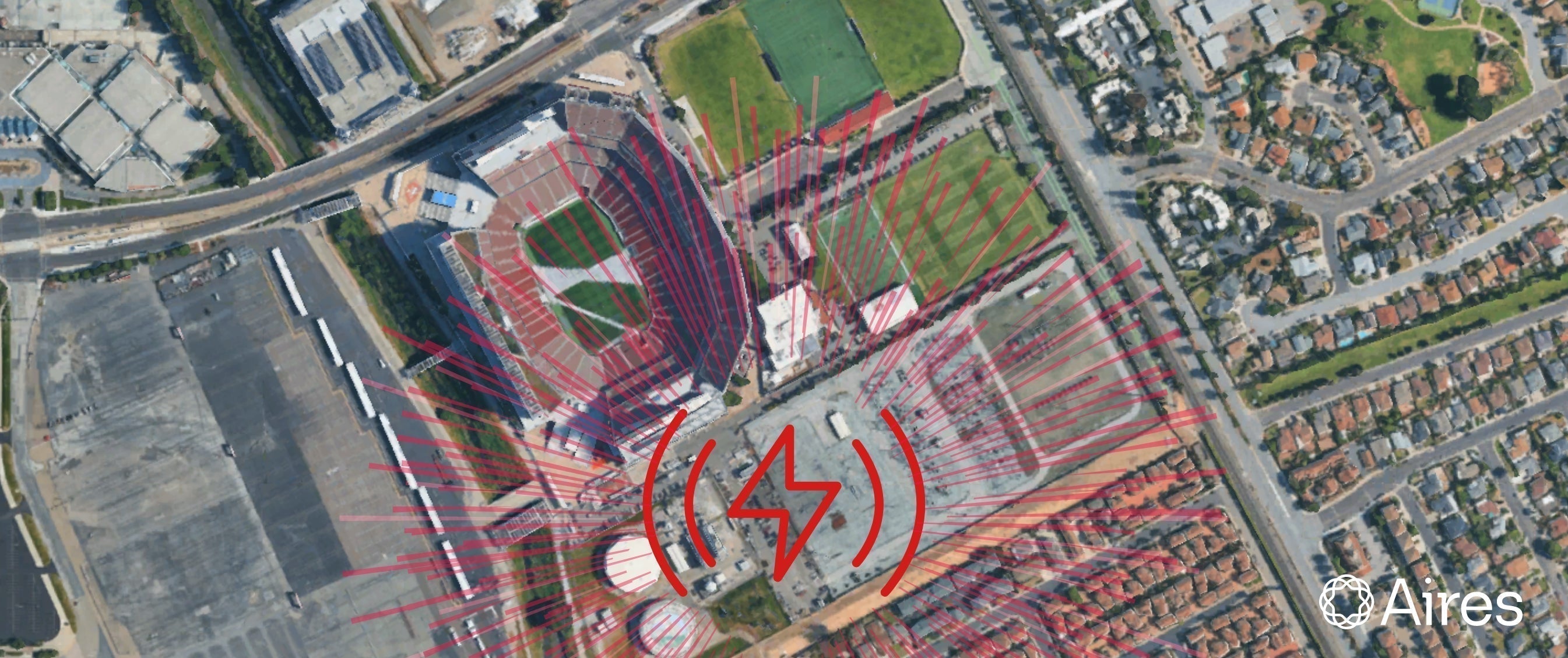 The 49ers Substation Theory: A Super Bowl Week Update. Aerial photo of Levis Field, home of the San Francisco 49ers, practice field, and the controversial power station next door, with a custom graphic overlay showing the emf radiation. ©Aires.
