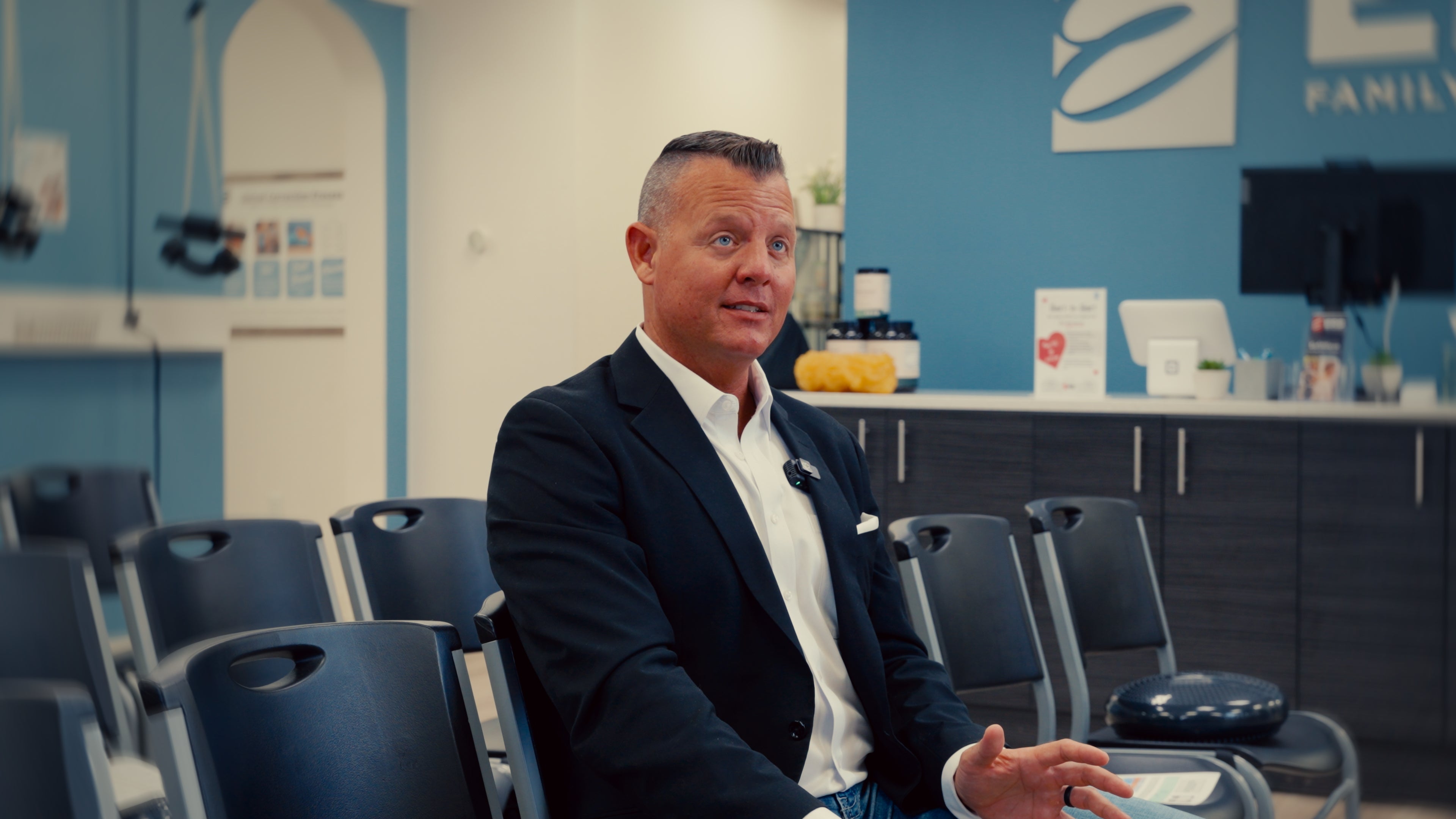 Dr. David Erb being interviewed inside Erb Family Wellness clinic during filming for The Big Reveal documentary.