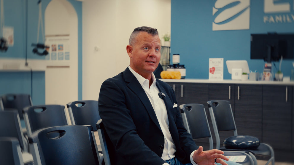 Dr. David Erb being interviewed inside Erb Family Wellness clinic during filming for The Big Reveal documentary.