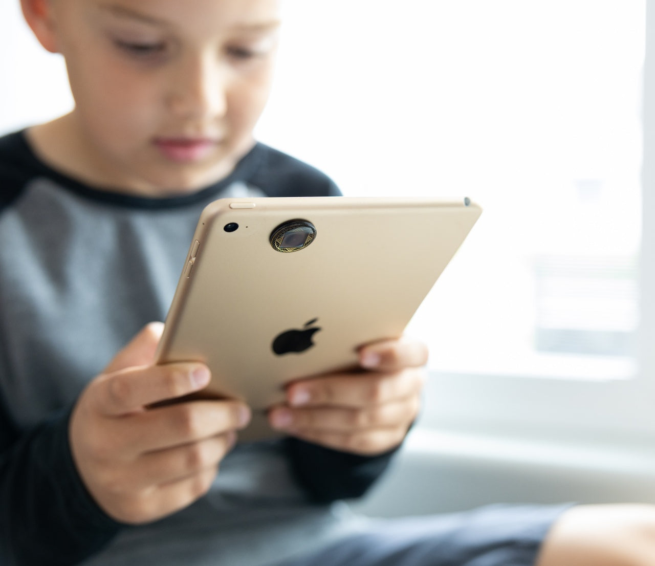 Child with iPad
