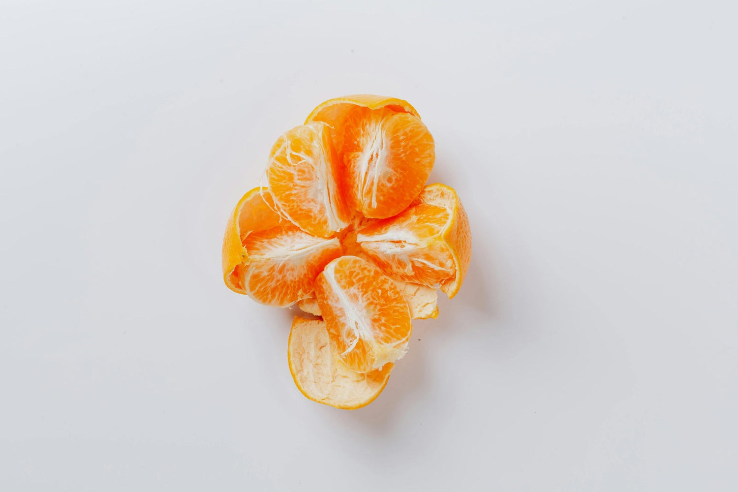 A peeled orange on a table