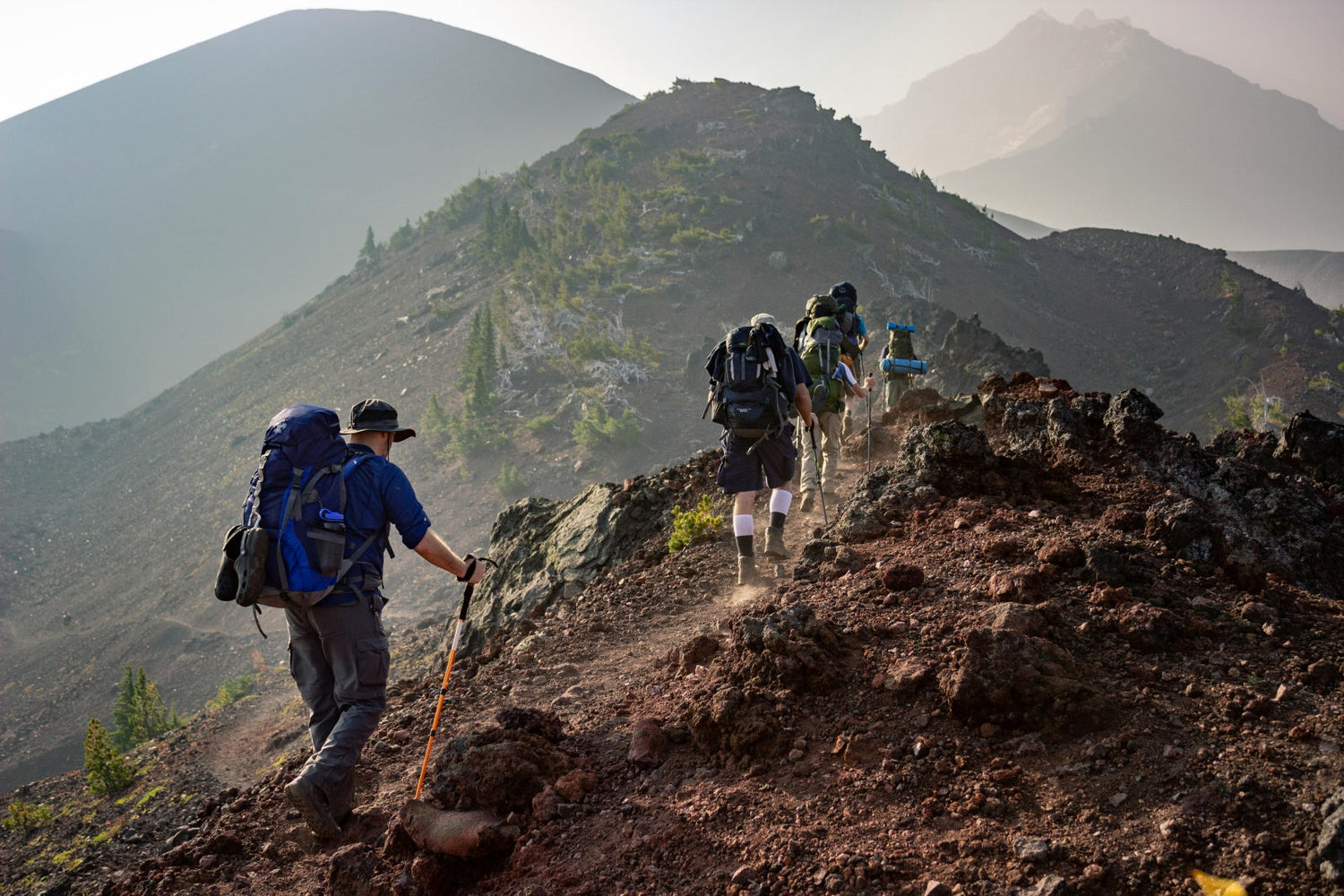 Hikers walking up a mountain