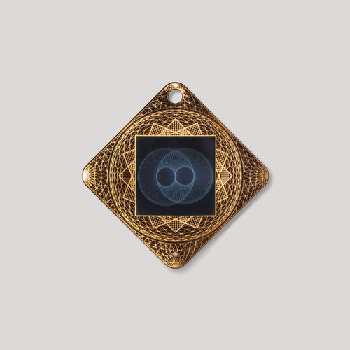 Lifetune Flex EMF protection pendant with gold geometric design on white background
